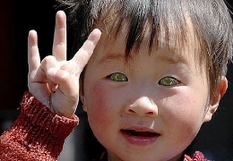 Cat-eyed chinese boy